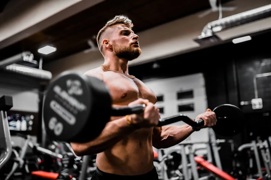 Athlete lifting a loaded barbell in a gym