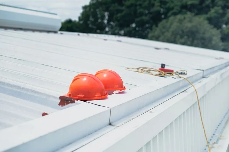 Flat roof with safety equipment and roofing tools