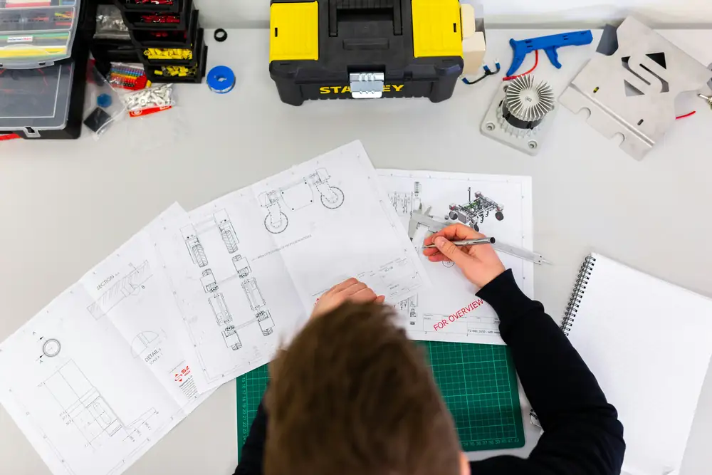 Commercial electrician preparing tools on a workbench