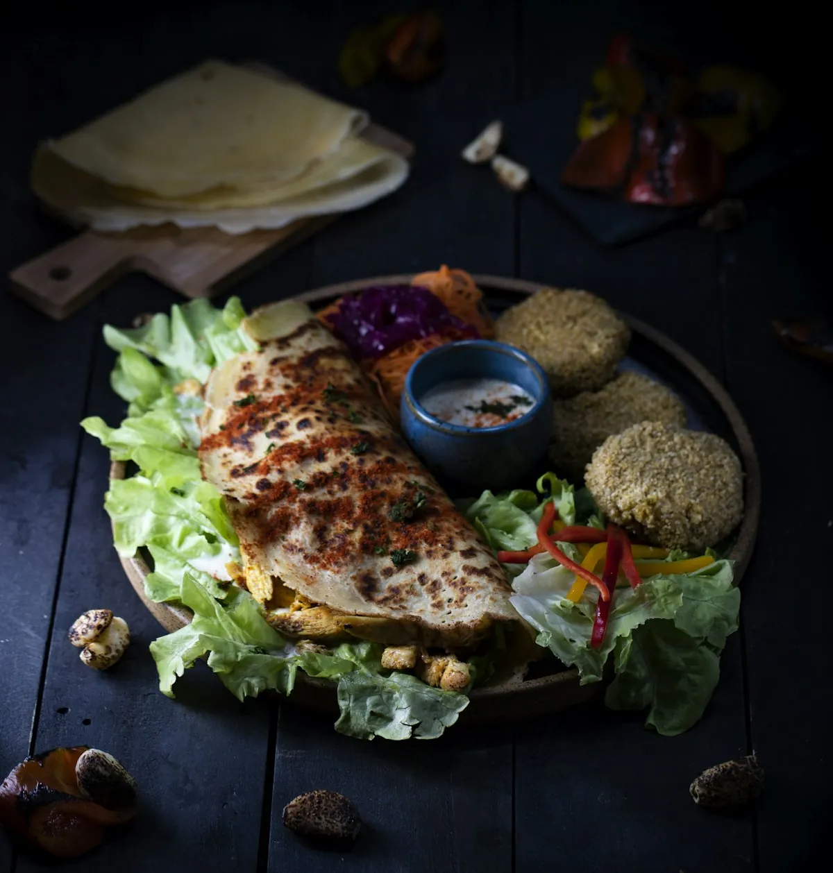Filled pitta wrap with grilled chicken and salad
